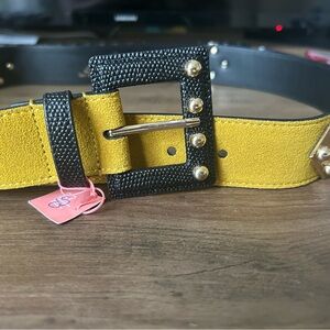 Cabi leather belt. Size medium. Black and mustard color. Brass studs.